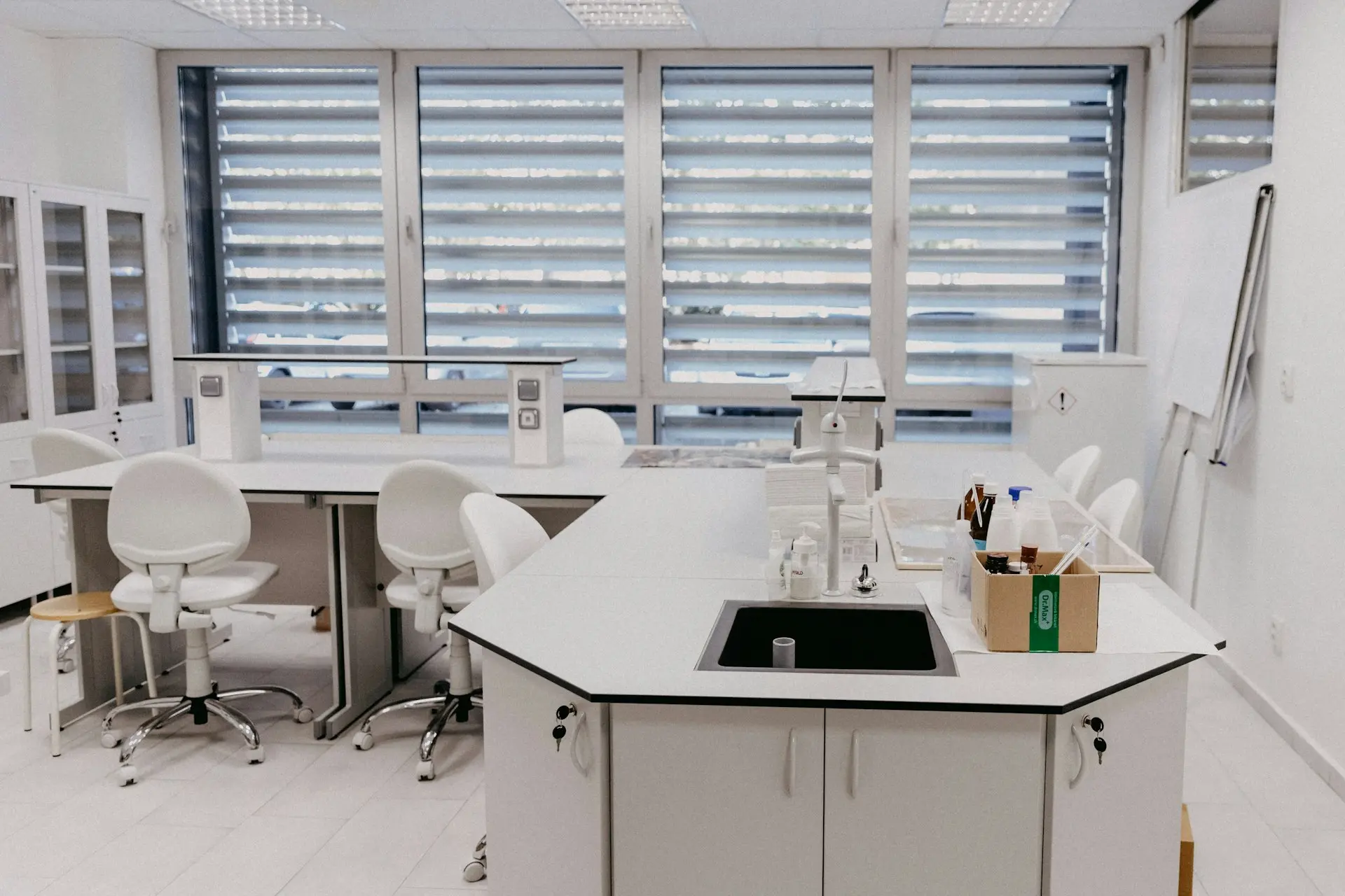 white wooden table with chairs